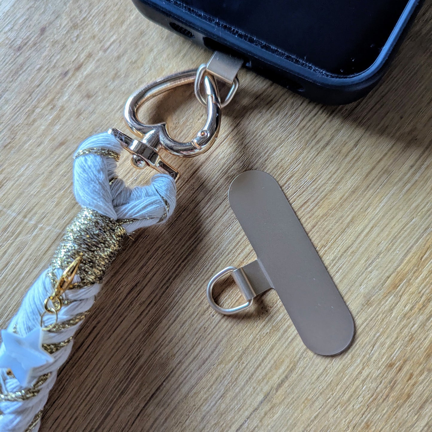 Support pour sangle de téléphone à glisser dans la coque